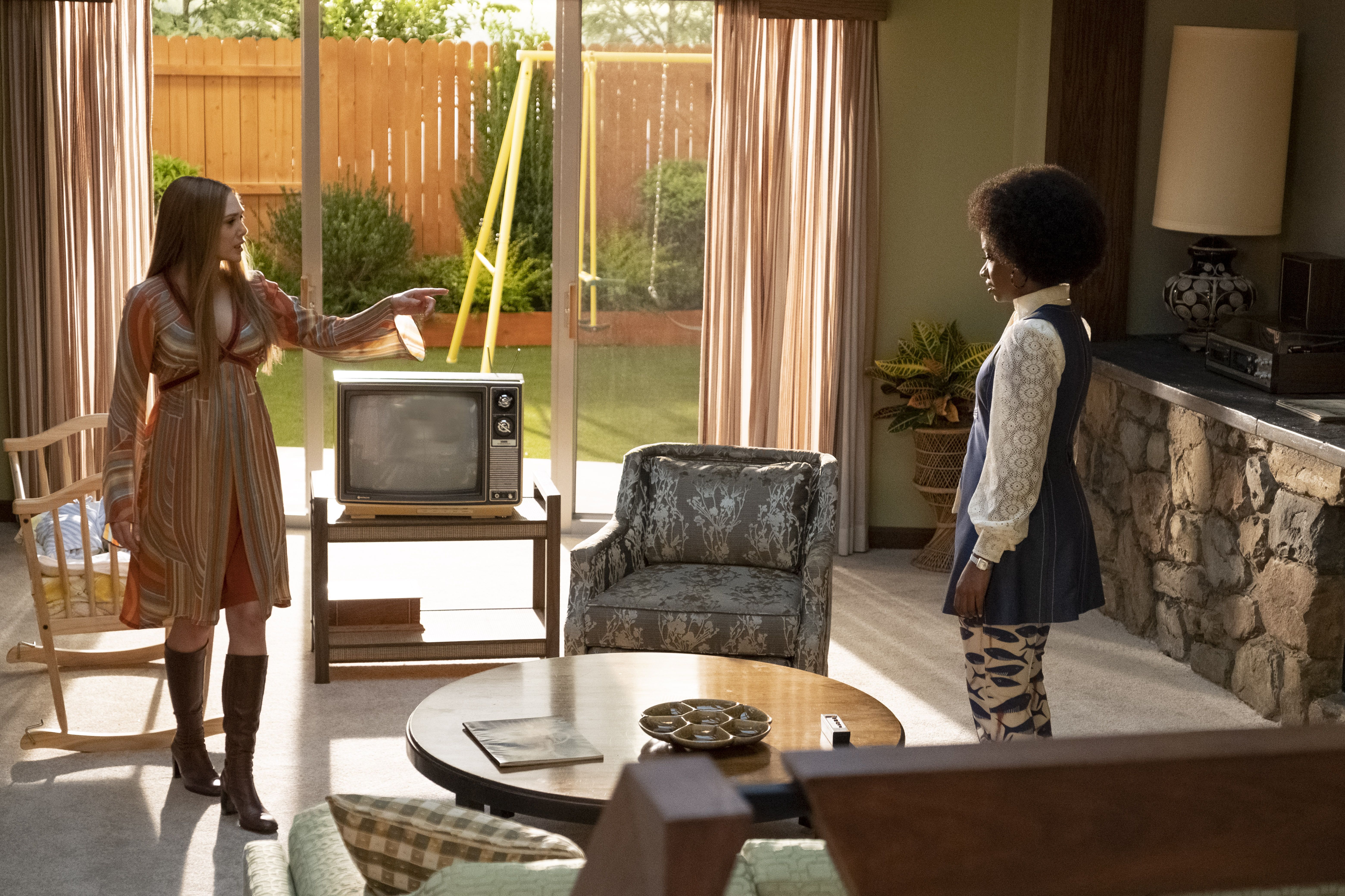 l r elizabeth olsen as wanda maximoff and teyonah parris as monica rambeau in marvel studios' wandavision exclusively on disney photo by chuck zlotnick ©marvel studios 2021 all rights reserved