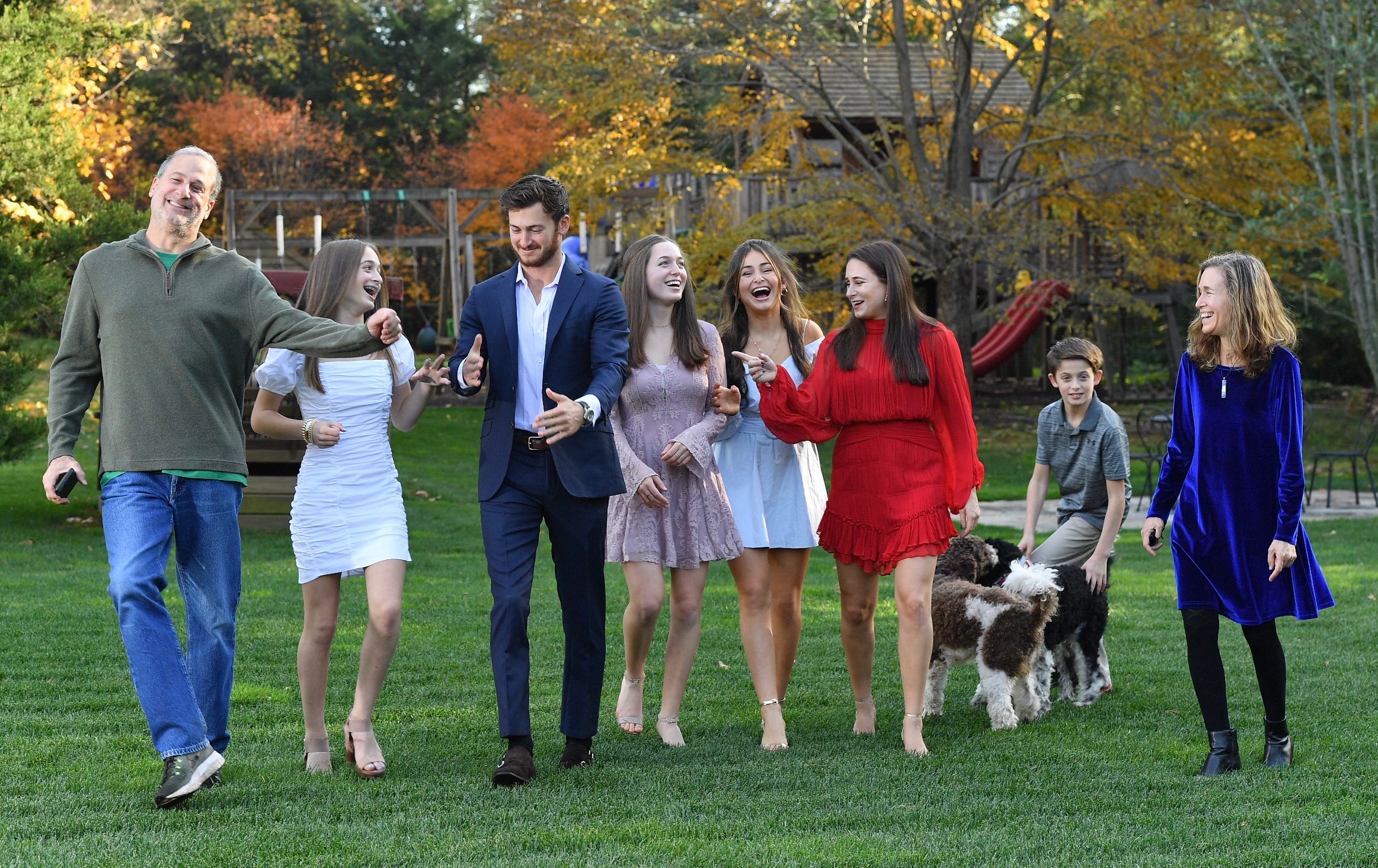 Melissa and Doug Bernstein are pictured on a lawn, laughing with their six children. melissa and doug bernstein of melissa and doug, pictured with their six children in connecticut