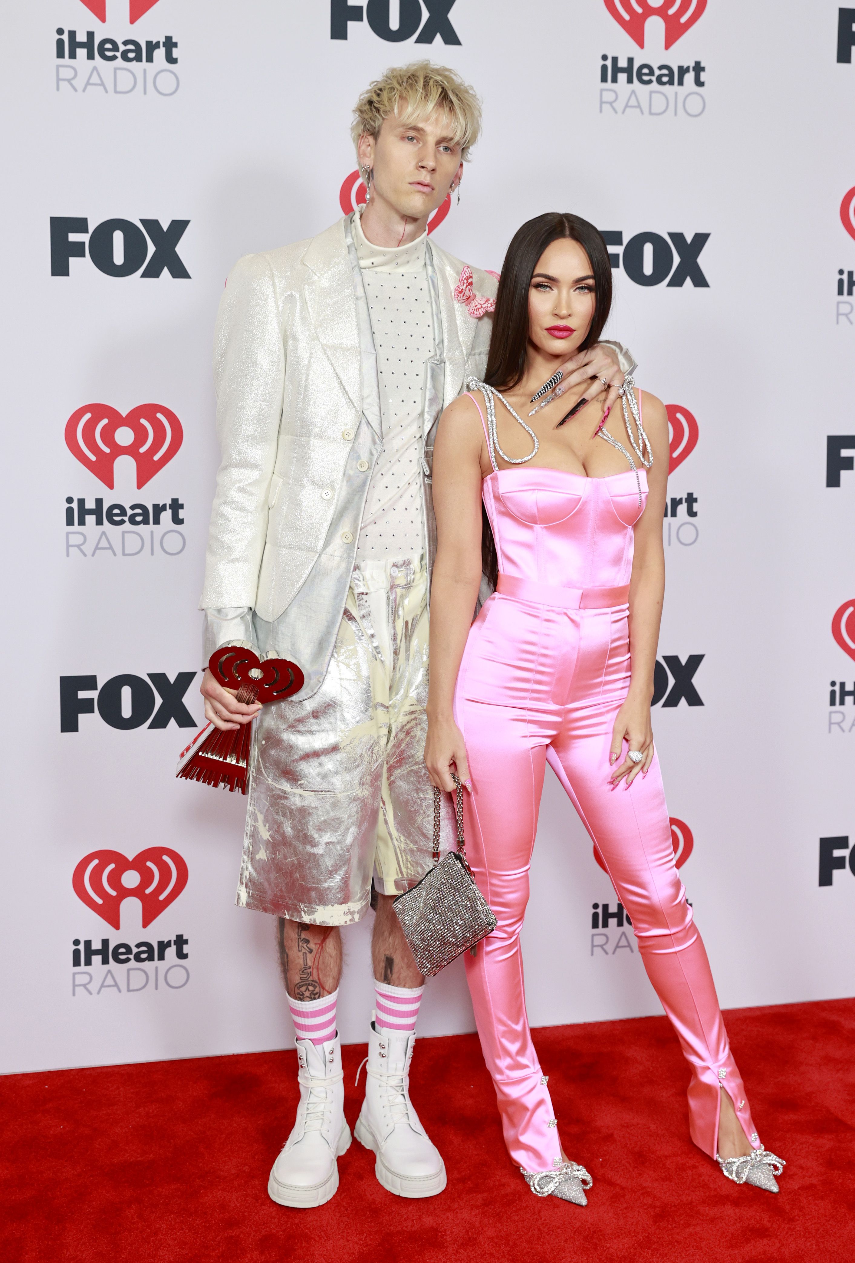 Megan Fox and Machine Gun Kelly at the 2021 iHeartRadio Music Awards megan fox and machine gun kelly at the 2021 iheartradio music awards
