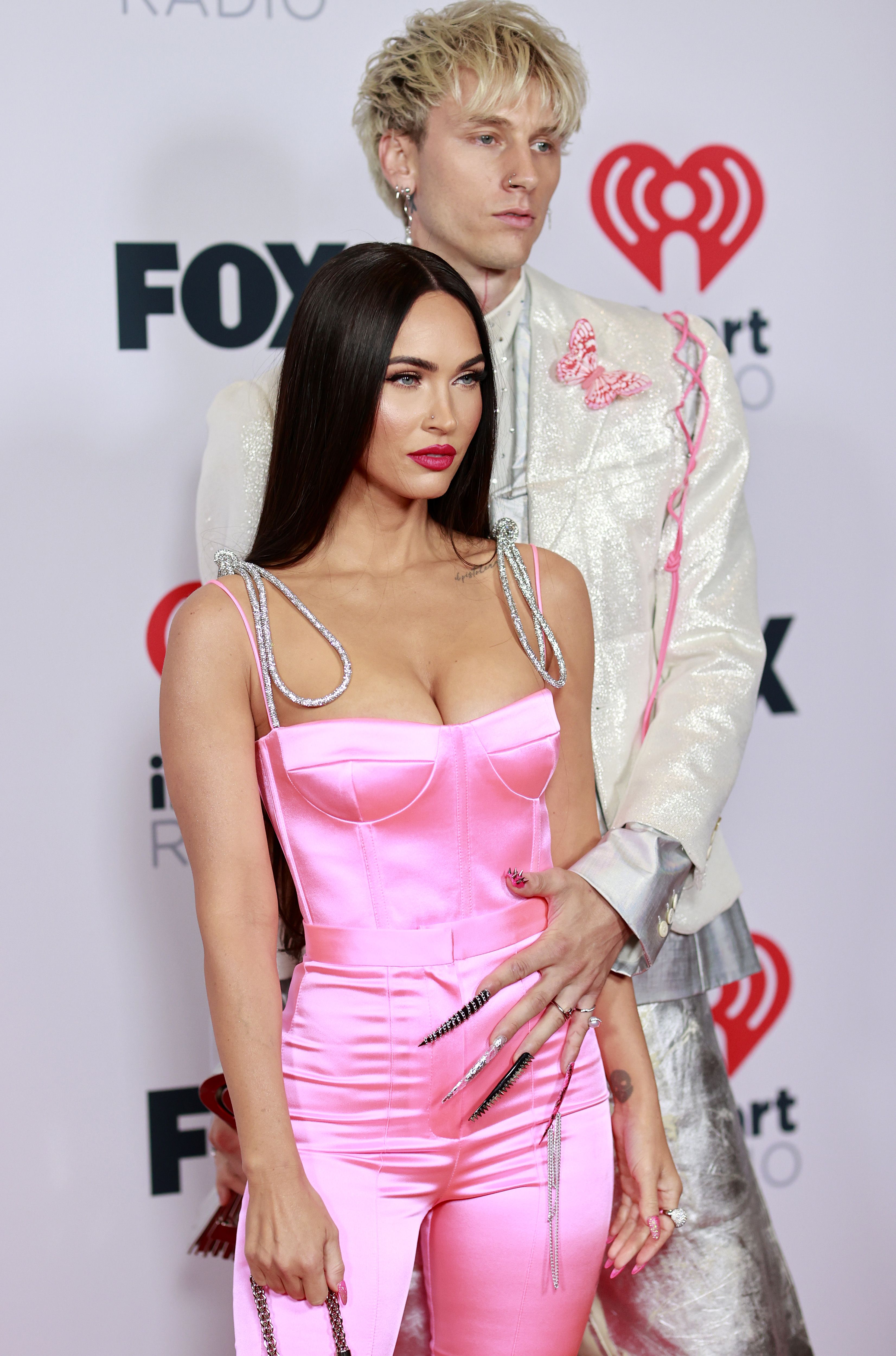 Megan Fox and Machine Gun Kelly at the 2021 iHeartRadio Music Awards megan fox and machine gun kelly at the 2021 iheartradio music awards