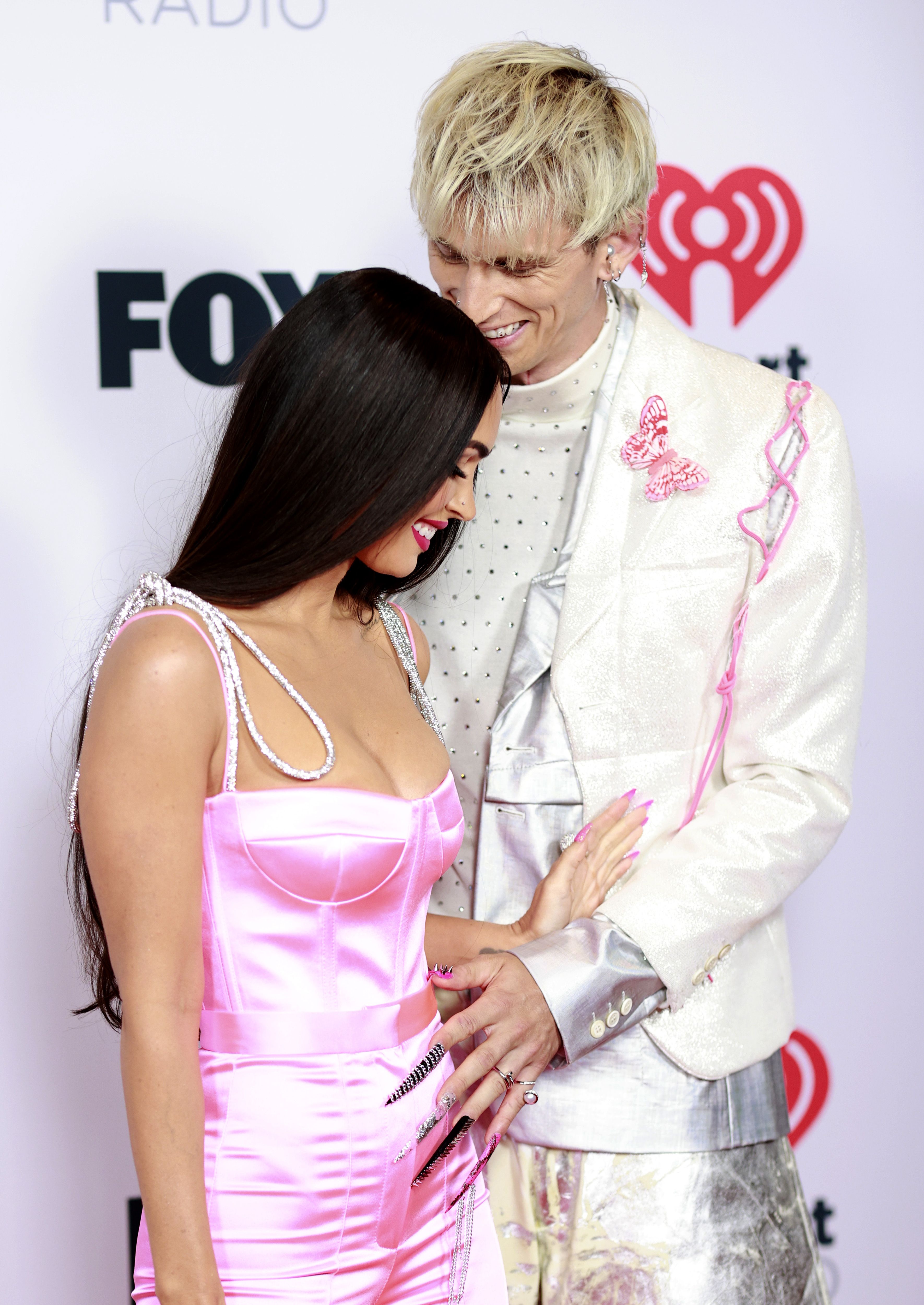 Megan Fox and Machine Gun Kelly at the 2021 iHeartRadio Music Awards megan fox and machine gun kelly at the 2021 iheartradio music awards